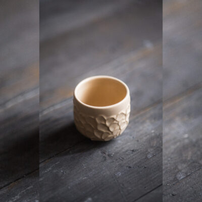 textured beige handmade ceramic cup