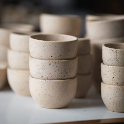 beige speckled coffee mugs