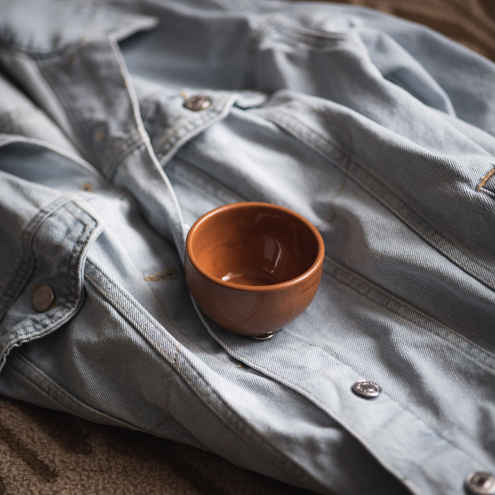 warm brown ceramic coffee cup