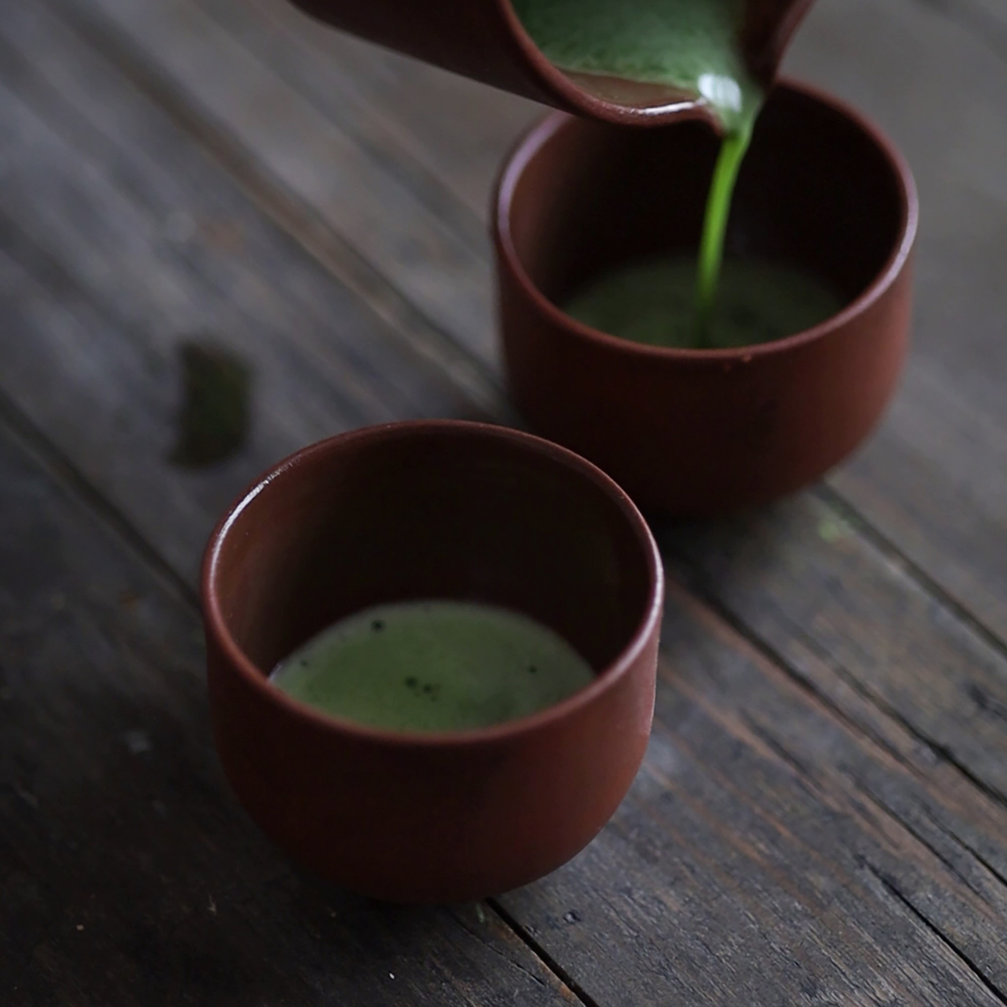 handmade ceramic matcha set in brown clay - umbra by mun